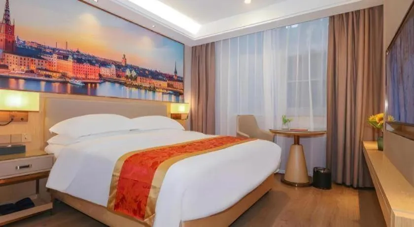 Bed in SHANGJINGHAO HOTEL （SAKATA SNOW ELEPHANT SUBWAY STATION SHOP）