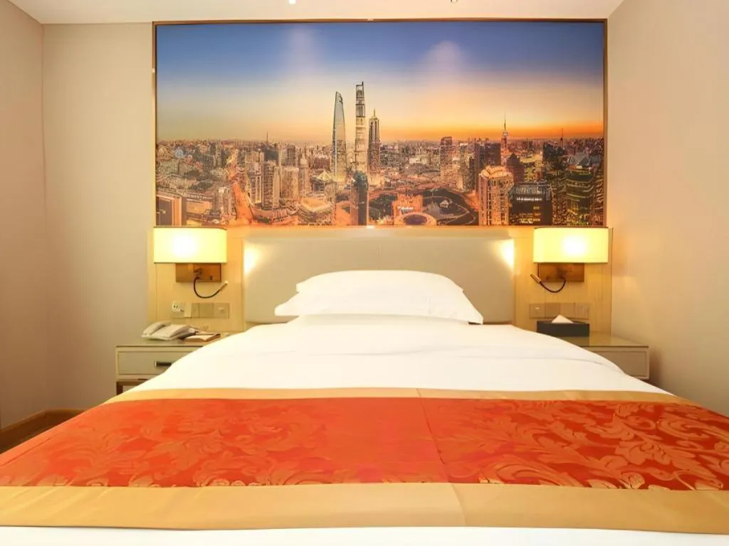 Bed in SHANGJINGHAO HOTEL （SAKATA SNOW ELEPHANT SUBWAY STATION SHOP）