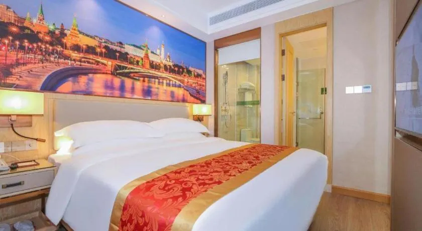 Bed in SHANGJINGHAO HOTEL （SAKATA SNOW ELEPHANT SUBWAY STATION SHOP）