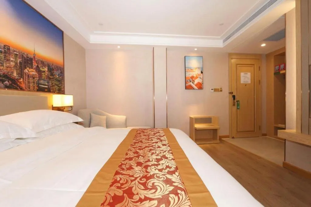Bed in SHANGJINGHAO HOTEL （SAKATA SNOW ELEPHANT SUBWAY STATION SHOP）