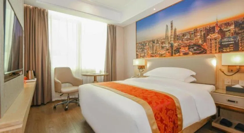 Bed in SHANGJINGHAO HOTEL （SAKATA SNOW ELEPHANT SUBWAY STATION SHOP）