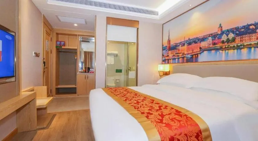 Bed in SHANGJINGHAO HOTEL （SAKATA SNOW ELEPHANT SUBWAY STATION SHOP）