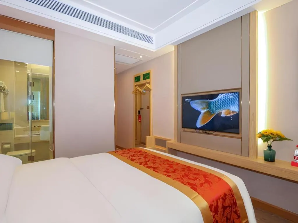 Bed in SHANGJINGHAO HOTEL （SAKATA SNOW ELEPHANT SUBWAY STATION SHOP）