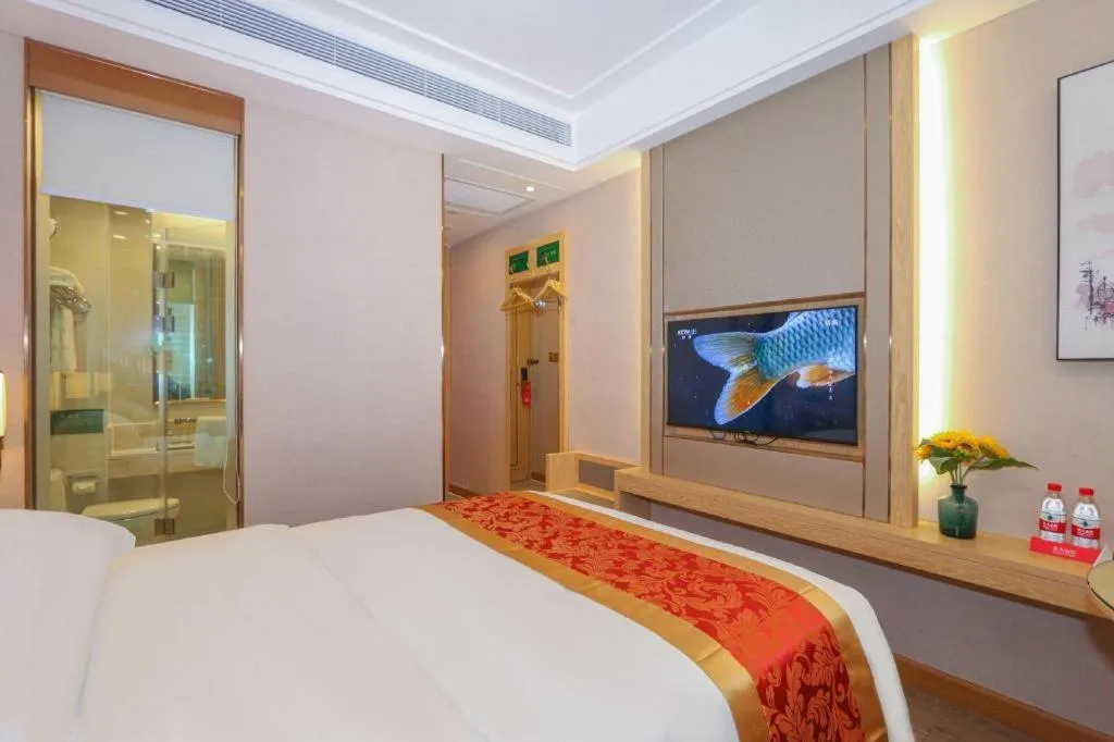 Bed in SHANGJINGHAO HOTEL （SAKATA SNOW ELEPHANT SUBWAY STATION SHOP）