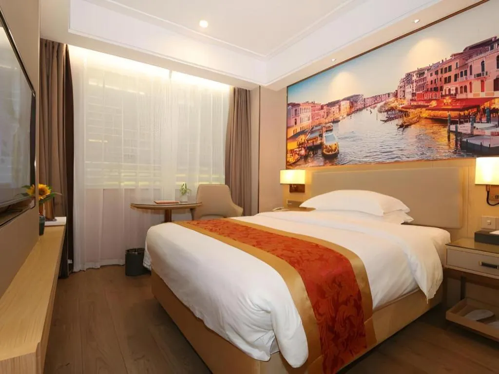 Bed in SHANGJINGHAO HOTEL （SAKATA SNOW ELEPHANT SUBWAY STATION SHOP）