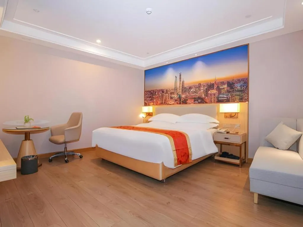 Bed in SHANGJINGHAO HOTEL （SAKATA SNOW ELEPHANT SUBWAY STATION SHOP）