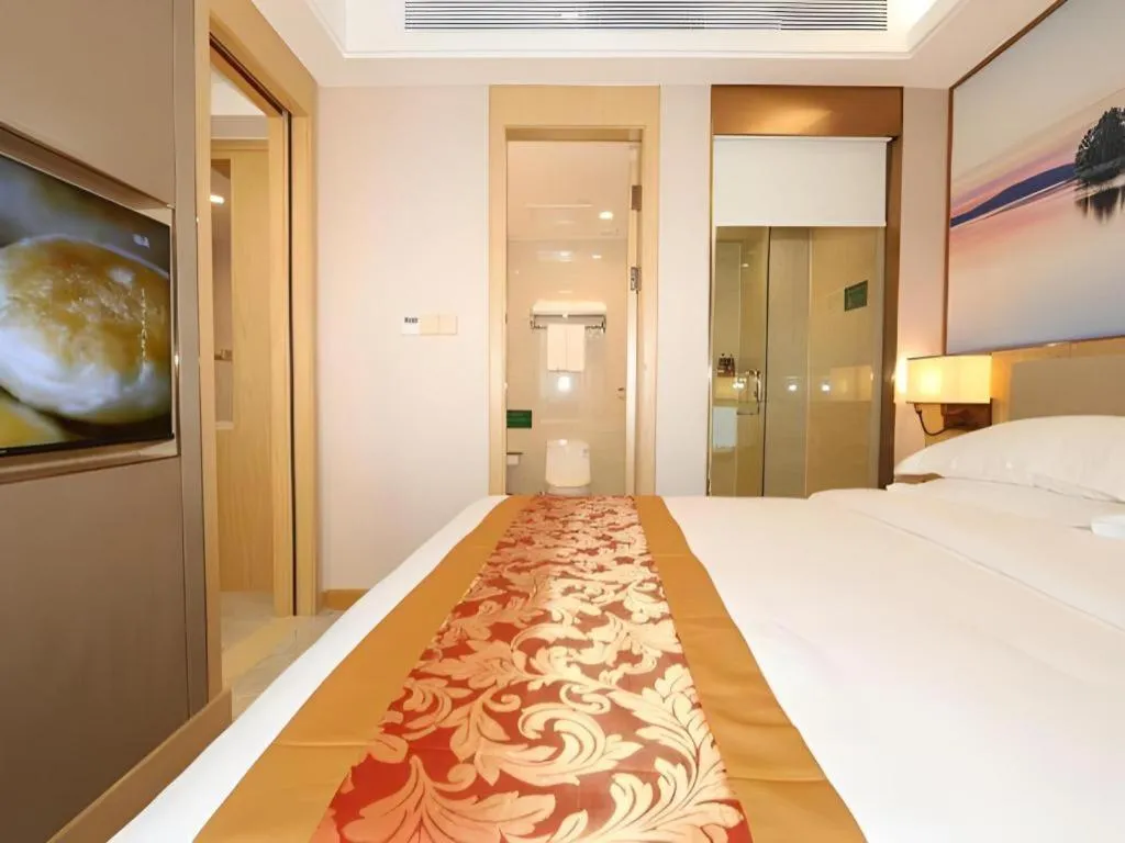 Bed in SHANGJINGHAO HOTEL （SAKATA SNOW ELEPHANT SUBWAY STATION SHOP）