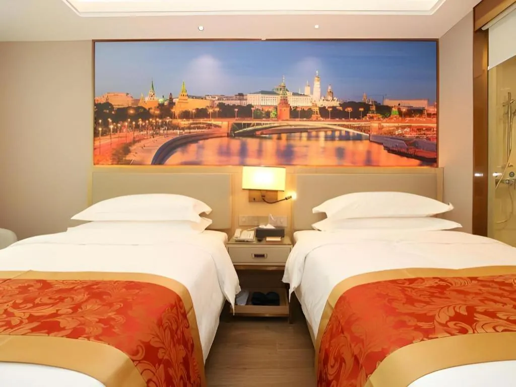 Bed in SHANGJINGHAO HOTEL （SAKATA SNOW ELEPHANT SUBWAY STATION SHOP）