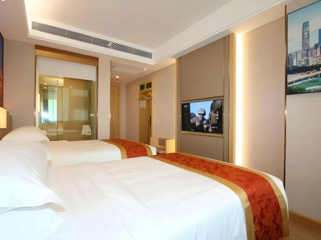 Bed in SHANGJINGHAO HOTEL （SAKATA SNOW ELEPHANT SUBWAY STATION SHOP）