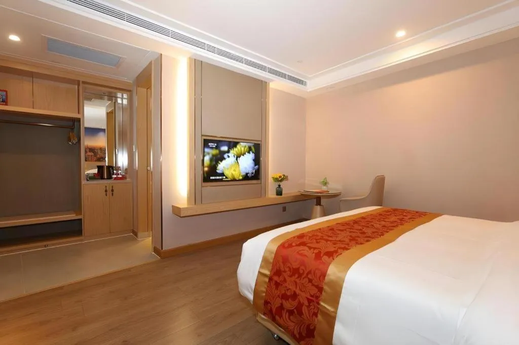 Bed in SHANGJINGHAO HOTEL （SAKATA SNOW ELEPHANT SUBWAY STATION SHOP）