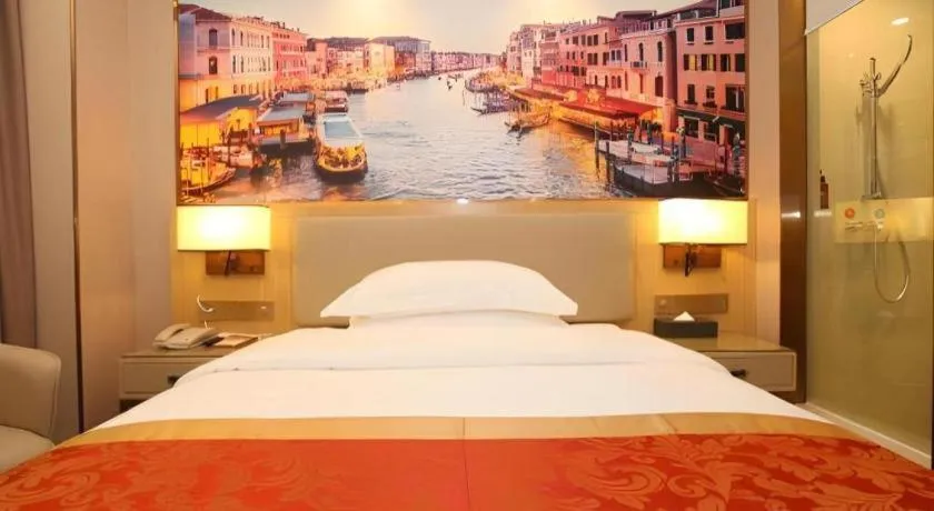 Bed in SHANGJINGHAO HOTEL （SAKATA SNOW ELEPHANT SUBWAY STATION SHOP）