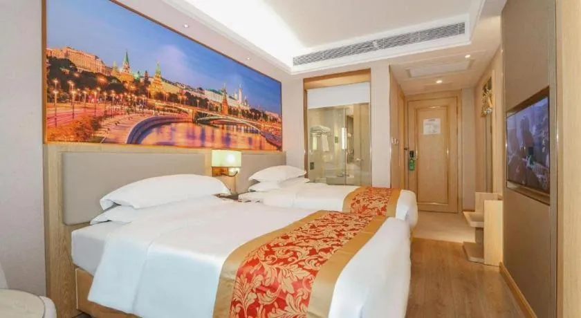 Bed in SHANGJINGHAO HOTEL （SAKATA SNOW ELEPHANT SUBWAY STATION SHOP）