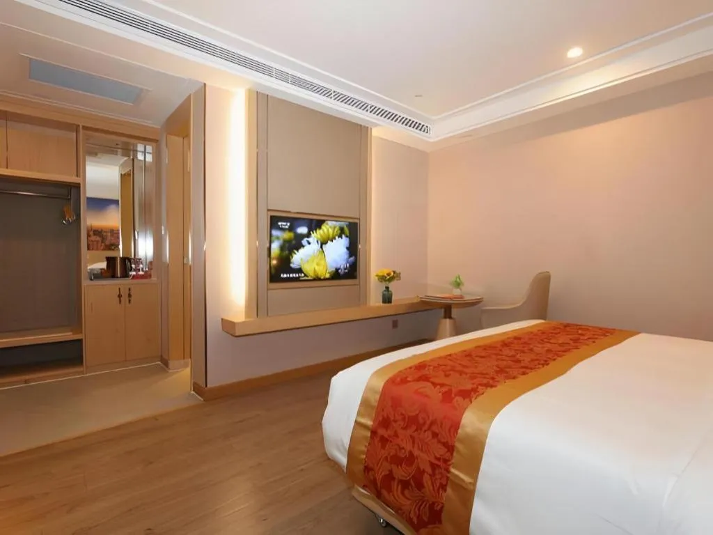 Bed in SHANGJINGHAO HOTEL （SAKATA SNOW ELEPHANT SUBWAY STATION SHOP）