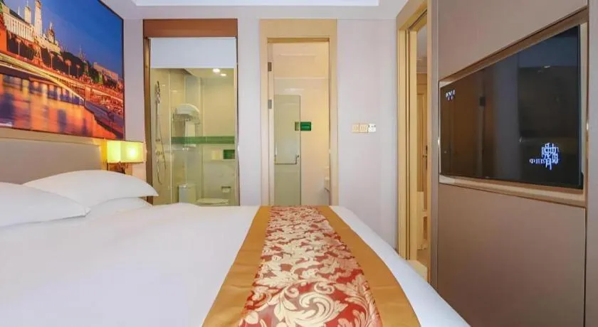Bed in SHANGJINGHAO HOTEL （SAKATA SNOW ELEPHANT SUBWAY STATION SHOP）