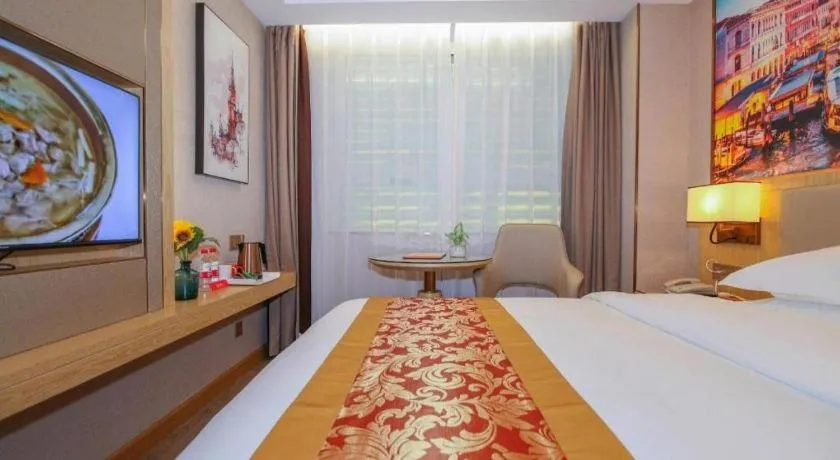 Bed in SHANGJINGHAO HOTEL （SAKATA SNOW ELEPHANT SUBWAY STATION SHOP）