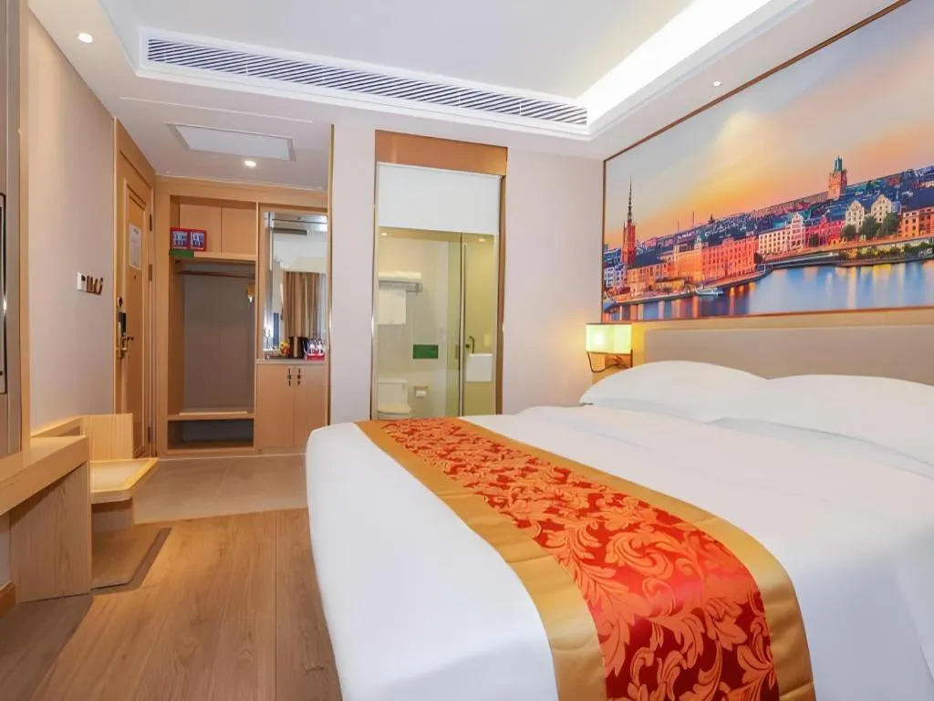 Bed in SHANGJINGHAO HOTEL （SAKATA SNOW ELEPHANT SUBWAY STATION SHOP）