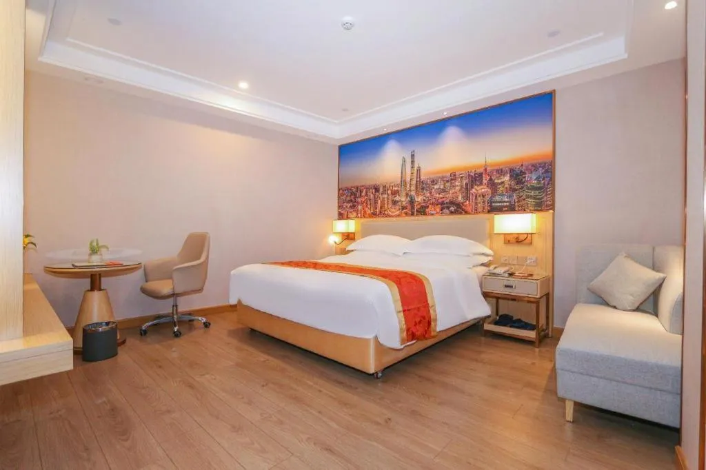 Bed in SHANGJINGHAO HOTEL （SAKATA SNOW ELEPHANT SUBWAY STATION SHOP）