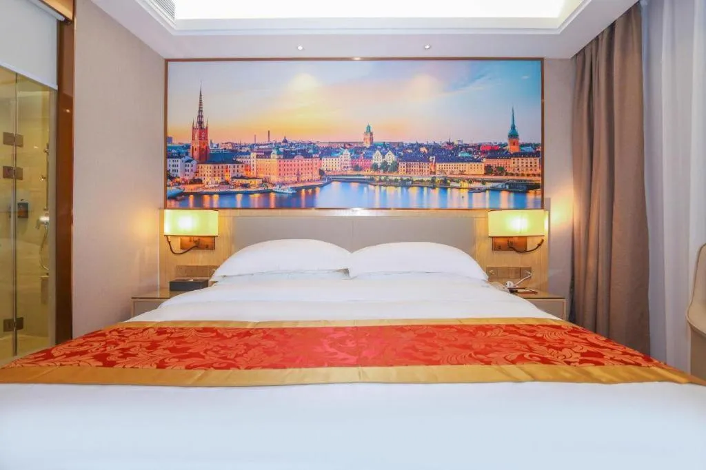 Bed in SHANGJINGHAO HOTEL （SAKATA SNOW ELEPHANT SUBWAY STATION SHOP）