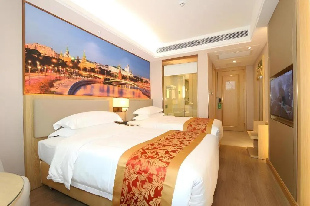 Bed in SHANGJINGHAO HOTEL （SAKATA SNOW ELEPHANT SUBWAY STATION SHOP）