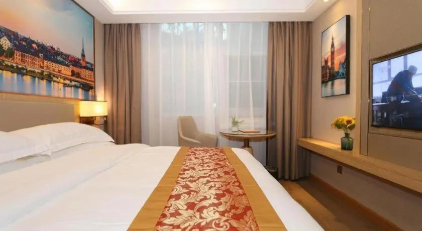 Bed in SHANGJINGHAO HOTEL （SAKATA SNOW ELEPHANT SUBWAY STATION SHOP）