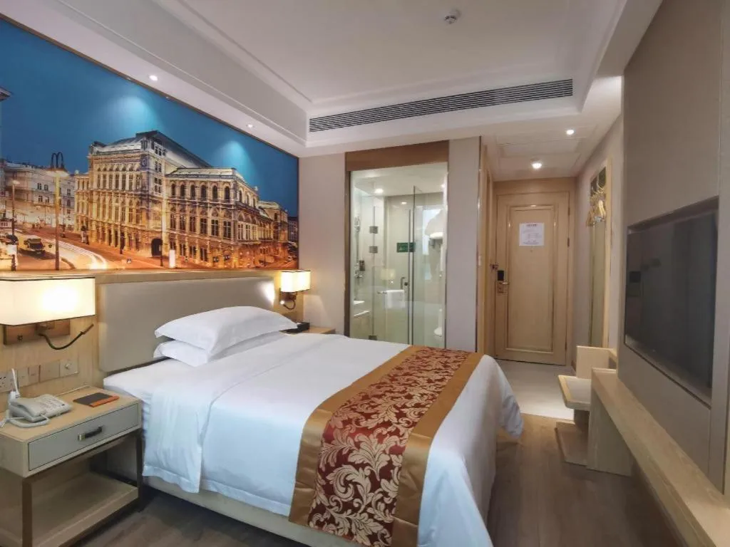 Bed in SHANGJINGHAO HOTEL （SAKATA SNOW ELEPHANT SUBWAY STATION SHOP）