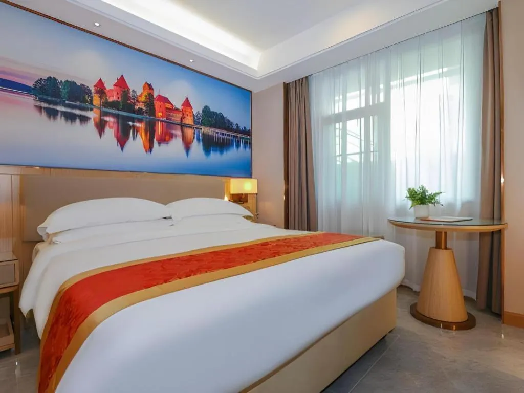 Bed in SHANGJINGHAO HOTEL （SAKATA SNOW ELEPHANT SUBWAY STATION SHOP）