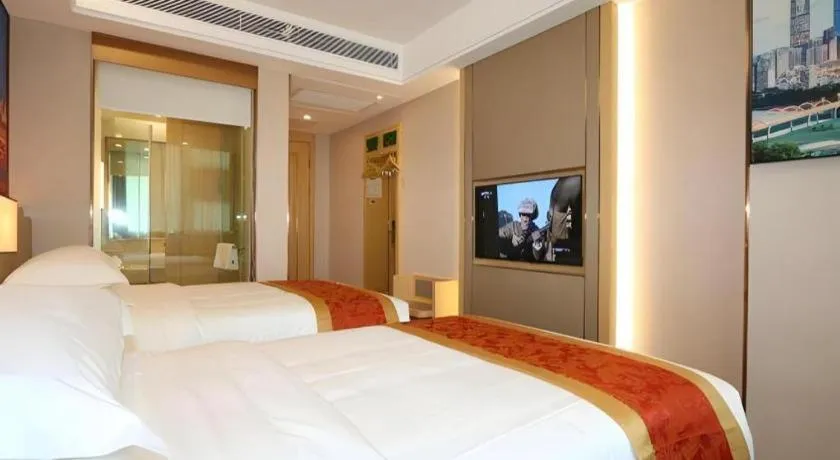 Bed in SHANGJINGHAO HOTEL （SAKATA SNOW ELEPHANT SUBWAY STATION SHOP）