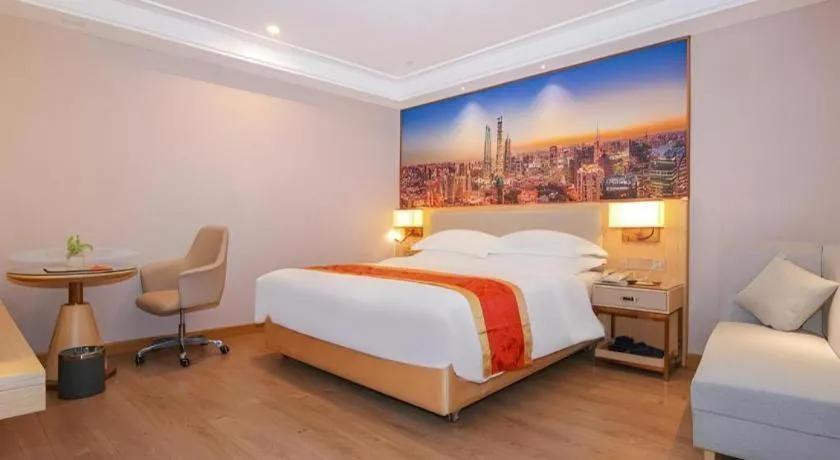 Bed in SHANGJINGHAO HOTEL （SAKATA SNOW ELEPHANT SUBWAY STATION SHOP）