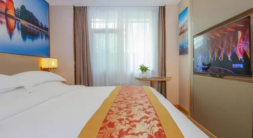 Bed in SHANGJINGHAO HOTEL （SAKATA SNOW ELEPHANT SUBWAY STATION SHOP）