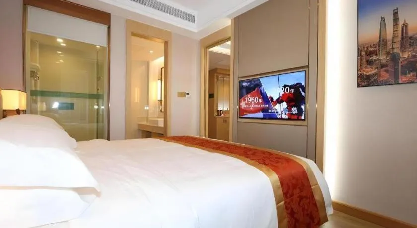 Bed in SHANGJINGHAO HOTEL （SAKATA SNOW ELEPHANT SUBWAY STATION SHOP）