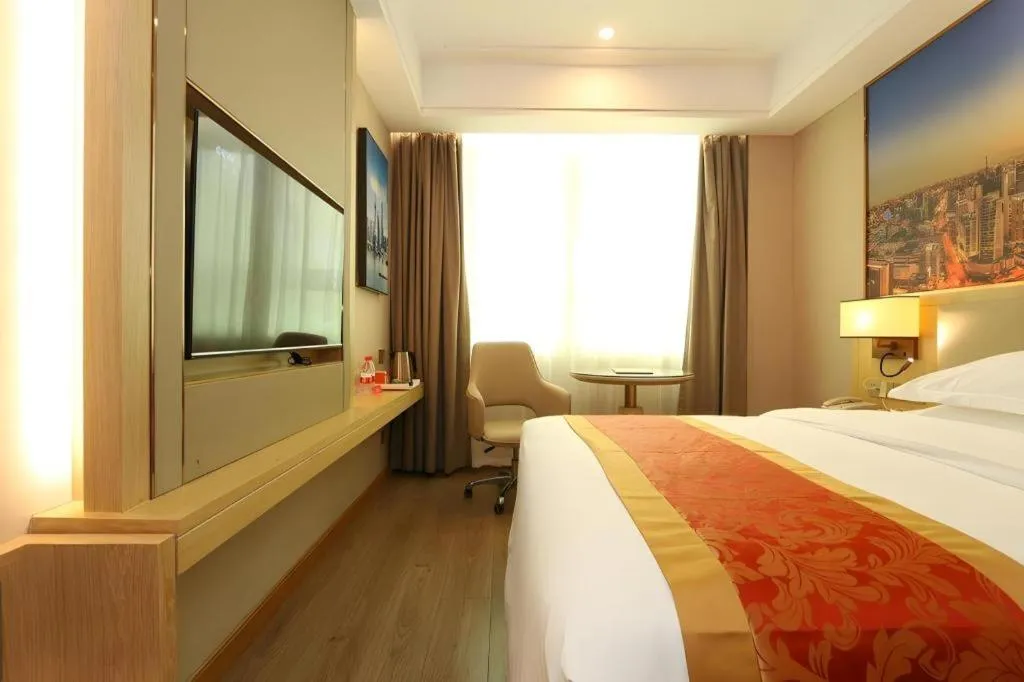 Bed in SHANGJINGHAO HOTEL （SAKATA SNOW ELEPHANT SUBWAY STATION SHOP）