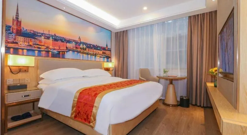 Bed in SHANGJINGHAO HOTEL （SAKATA SNOW ELEPHANT SUBWAY STATION SHOP）