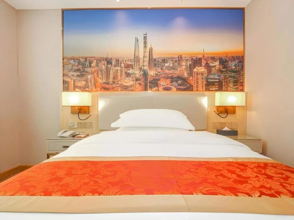 Bed in SHANGJINGHAO HOTEL （SAKATA SNOW ELEPHANT SUBWAY STATION SHOP）