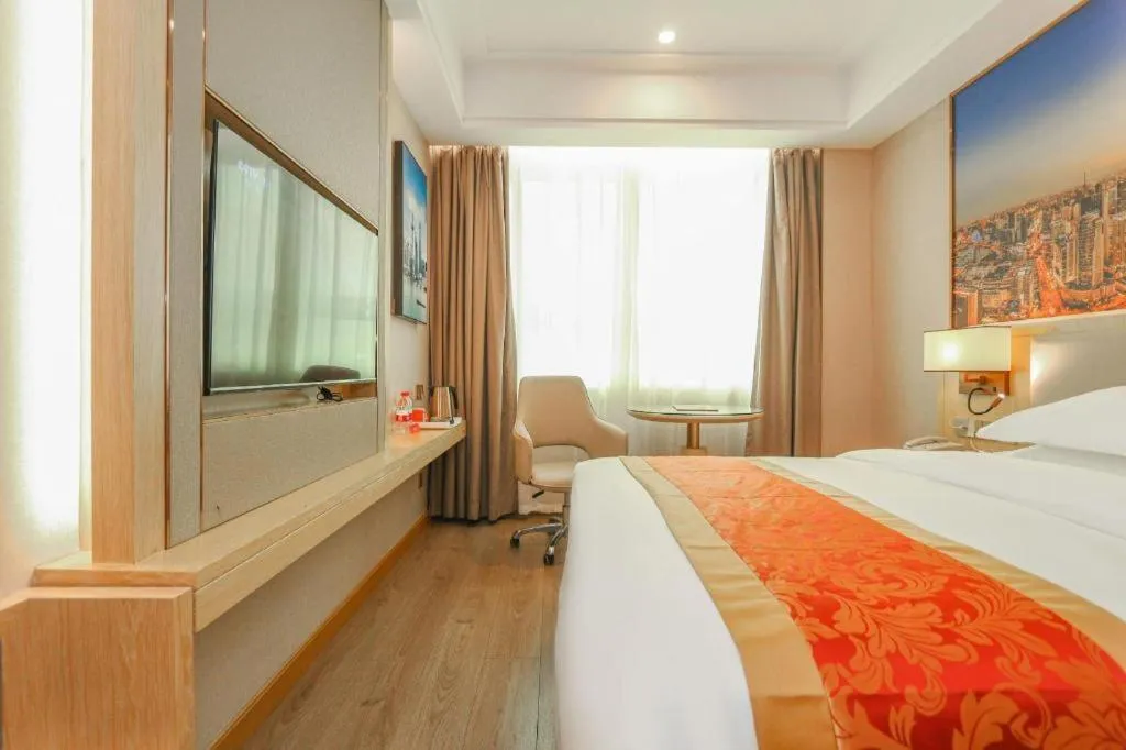 Bed in SHANGJINGHAO HOTEL （SAKATA SNOW ELEPHANT SUBWAY STATION SHOP）