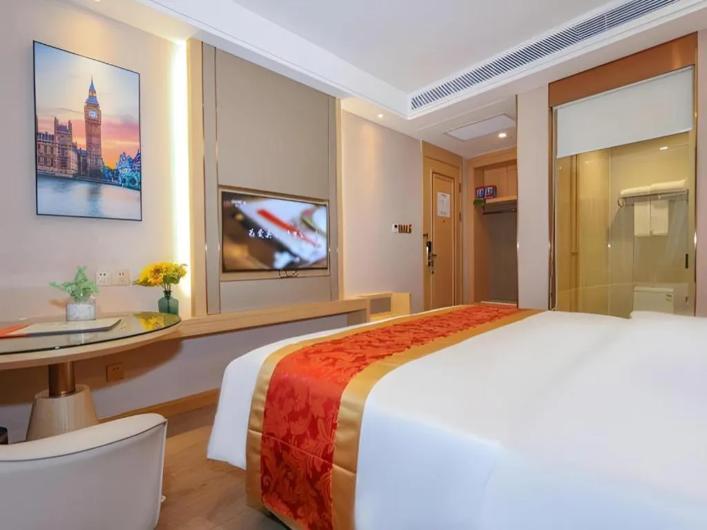 Bed in SHANGJINGHAO HOTEL （SAKATA SNOW ELEPHANT SUBWAY STATION SHOP）