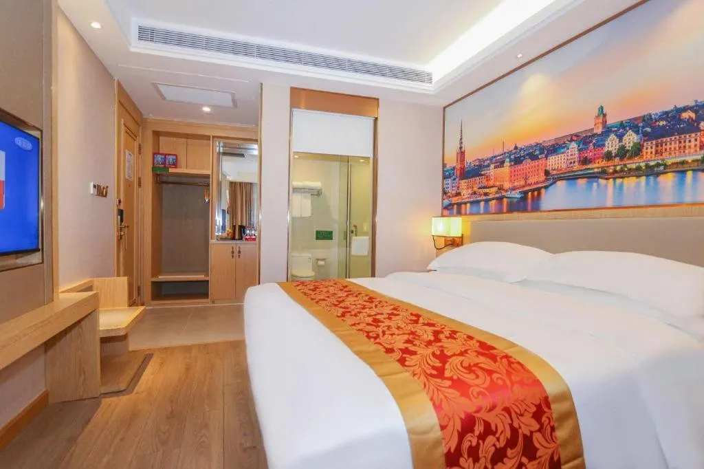 Bed in SHANGJINGHAO HOTEL （SAKATA SNOW ELEPHANT SUBWAY STATION SHOP）