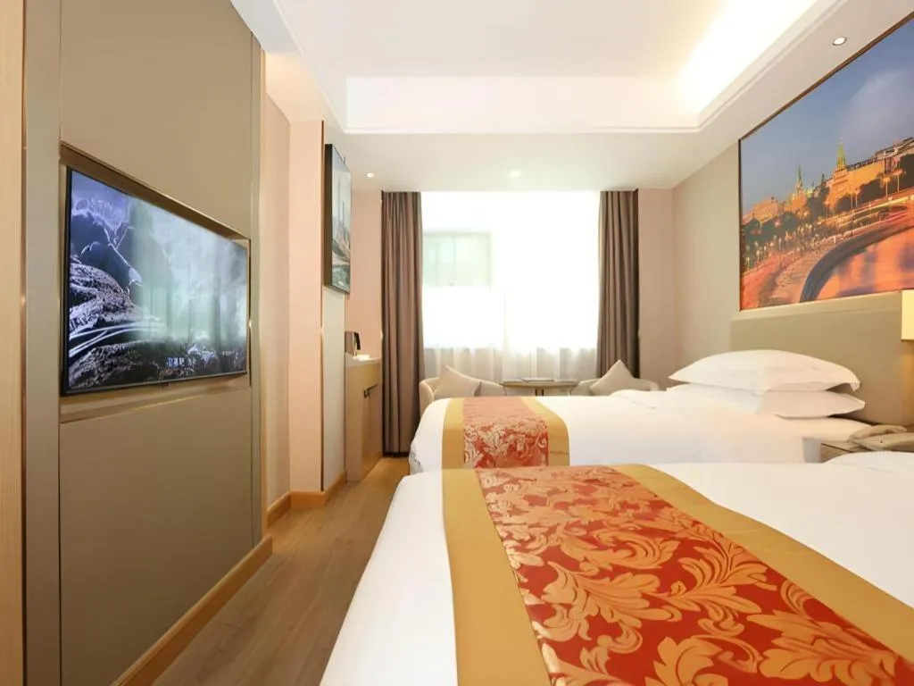 Bed in SHANGJINGHAO HOTEL （SAKATA SNOW ELEPHANT SUBWAY STATION SHOP）