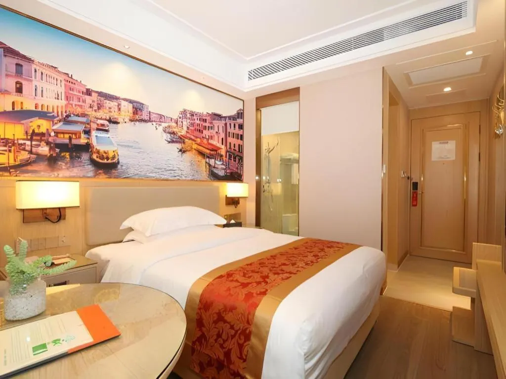 Bed in SHANGJINGHAO HOTEL （SAKATA SNOW ELEPHANT SUBWAY STATION SHOP）