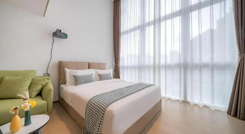 Bed in F-TOWN Fangtang Hotel (Shenzhen Longgang Tian'an Digital City Huanggekeng Subway Station)