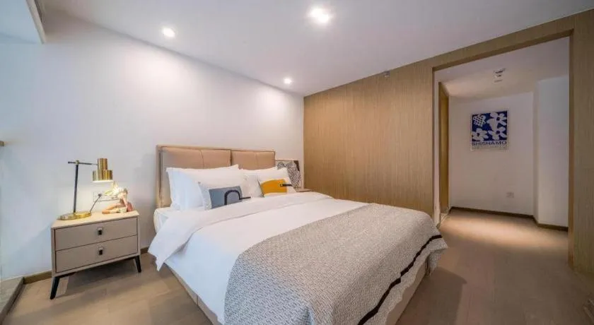 Bed in F-TOWN Fangtang Hotel (Shenzhen Longgang Tian'an Digital City Huanggekeng Subway Station)