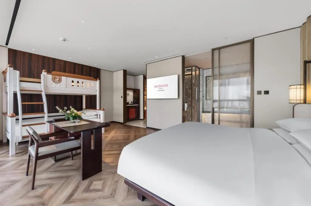 Bed in Mumian Rizhao Hotel