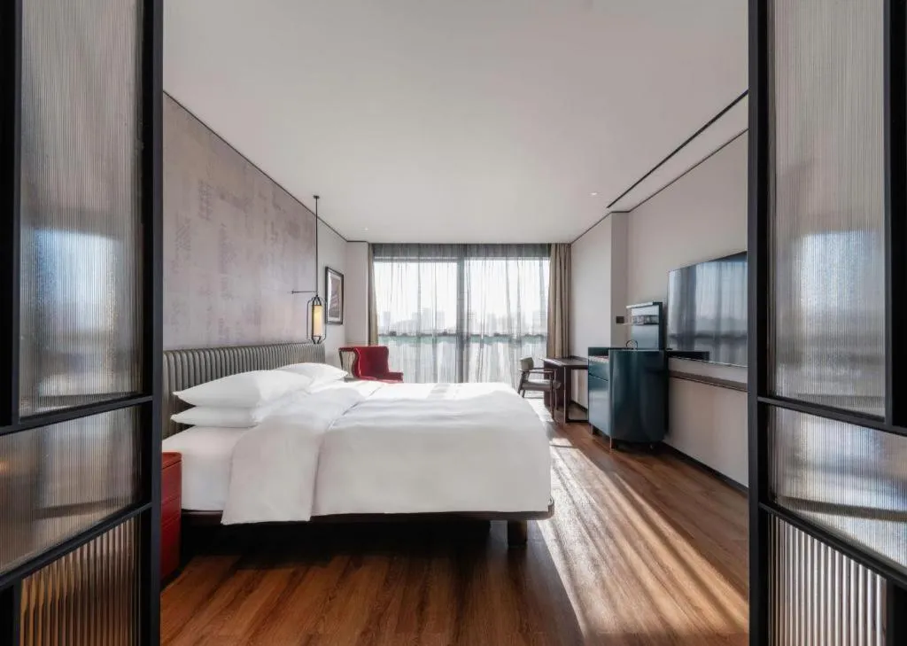 Bed in Mumian Rizhao Hotel