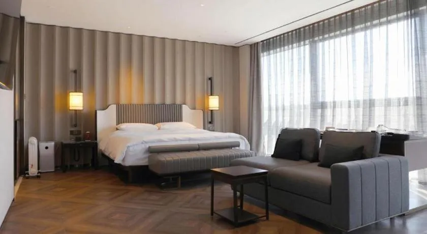 Bed in Mumian Rizhao Hotel