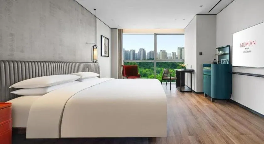 Bed in Mumian Rizhao Hotel