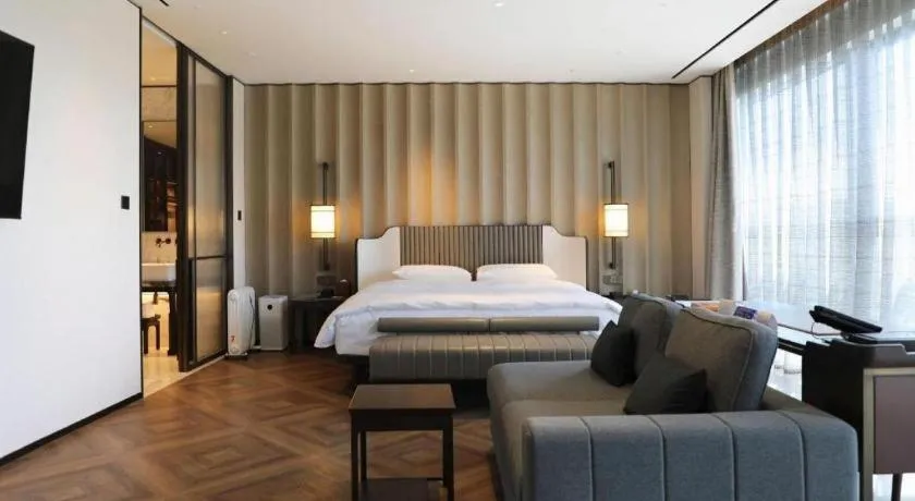 Bed in Mumian Rizhao Hotel