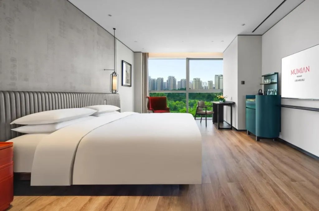 Bed in Mumian Rizhao Hotel