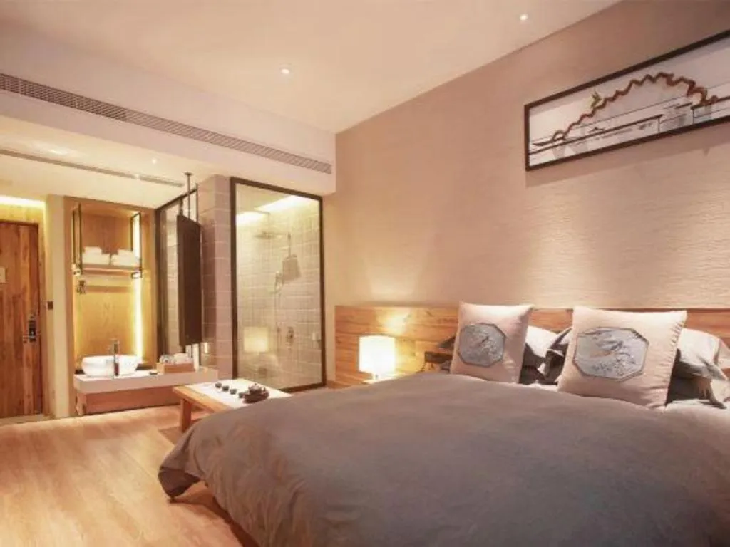 Bed in Yiqi Ecological Art Hotel Hangzhou Xixi Wetland Park Branch