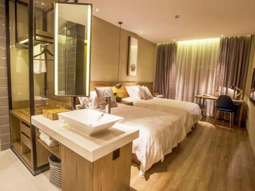 Bed in Yiqi Ecological Art Hotel Hangzhou Xixi Wetland Park Branch