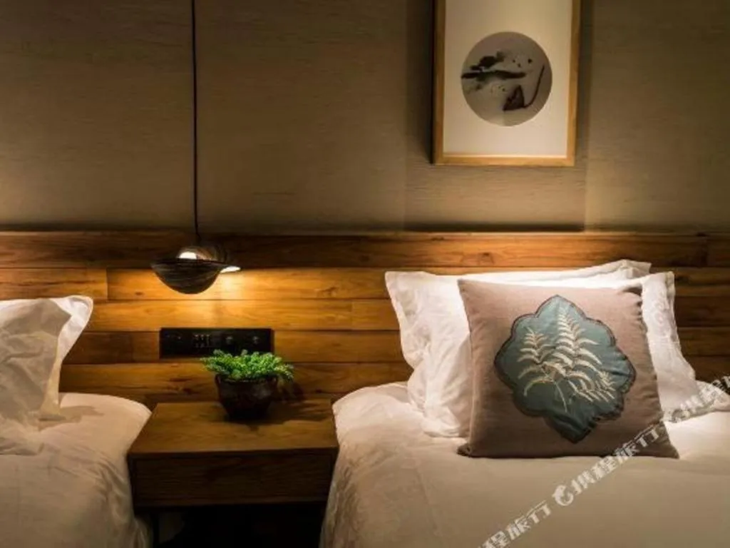 Bed in Yiqi Ecological Art Hotel Hangzhou Xixi Wetland Park Branch