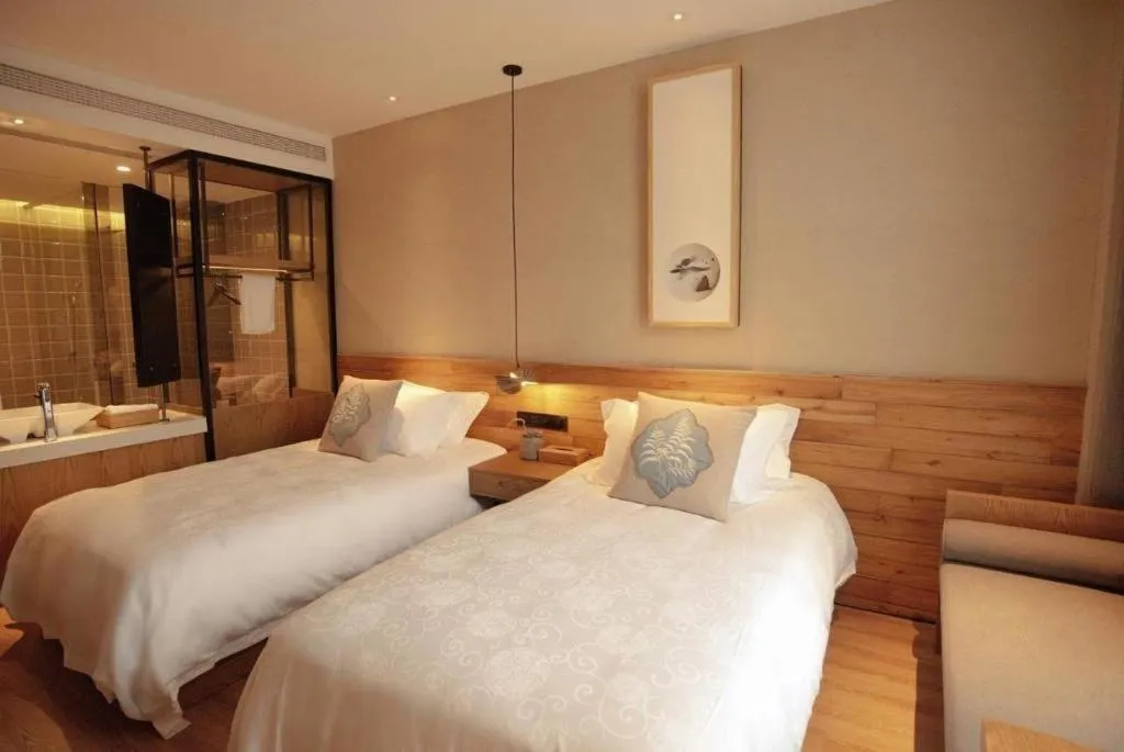 Bed in Yiqi Ecological Art Hotel Hangzhou Xixi Wetland Park Branch